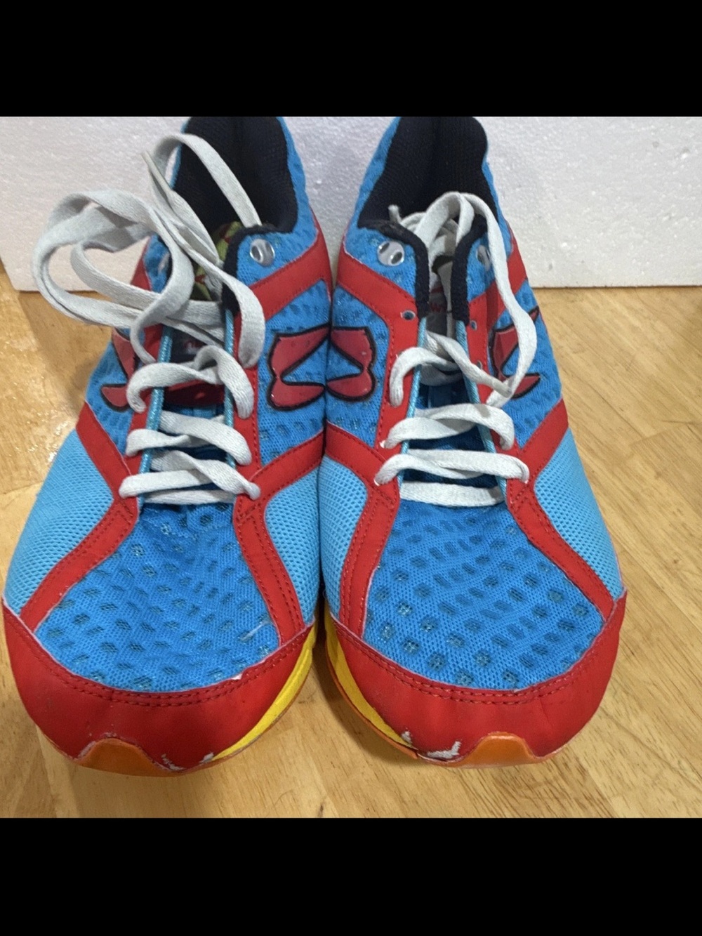 Newton Blue and Red Men’s Running Shoes with Yellow Accents